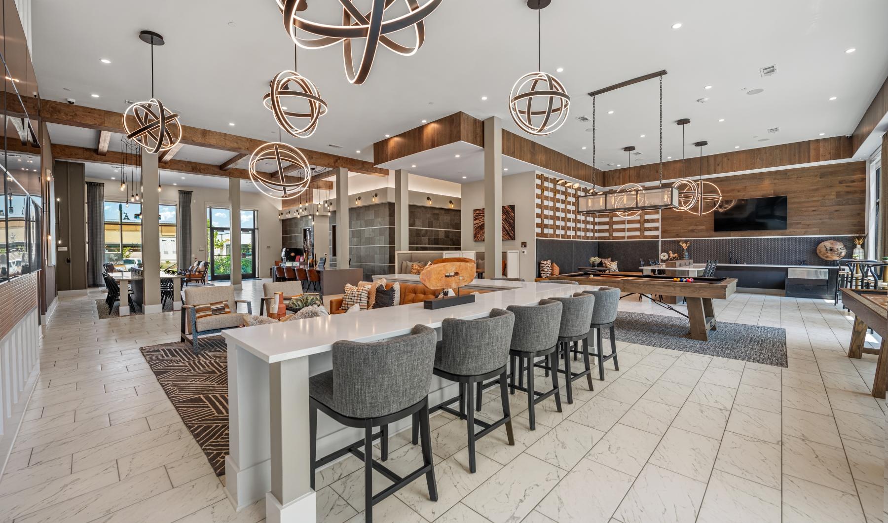 State-of-the-art amenities a large room with tables and chairs