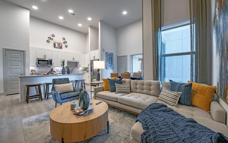 a living room with a couch and a table