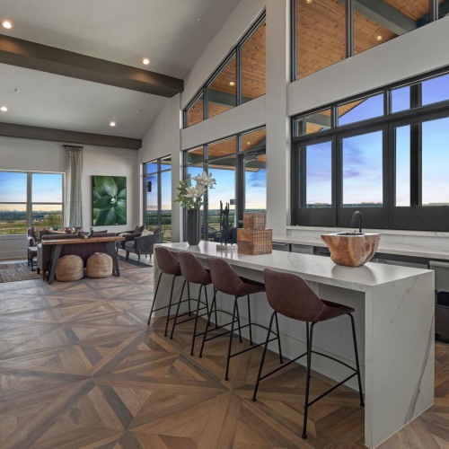 State-of-the-art amenities a clubhouse room with a table and chairs