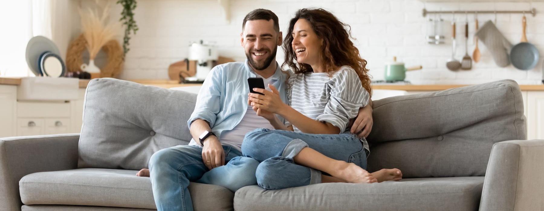 a man and a woman sitting on a couch
